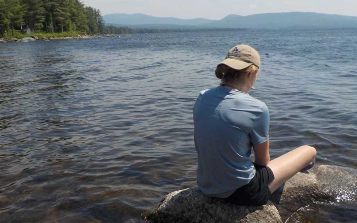 teen reflecting on canoeing course